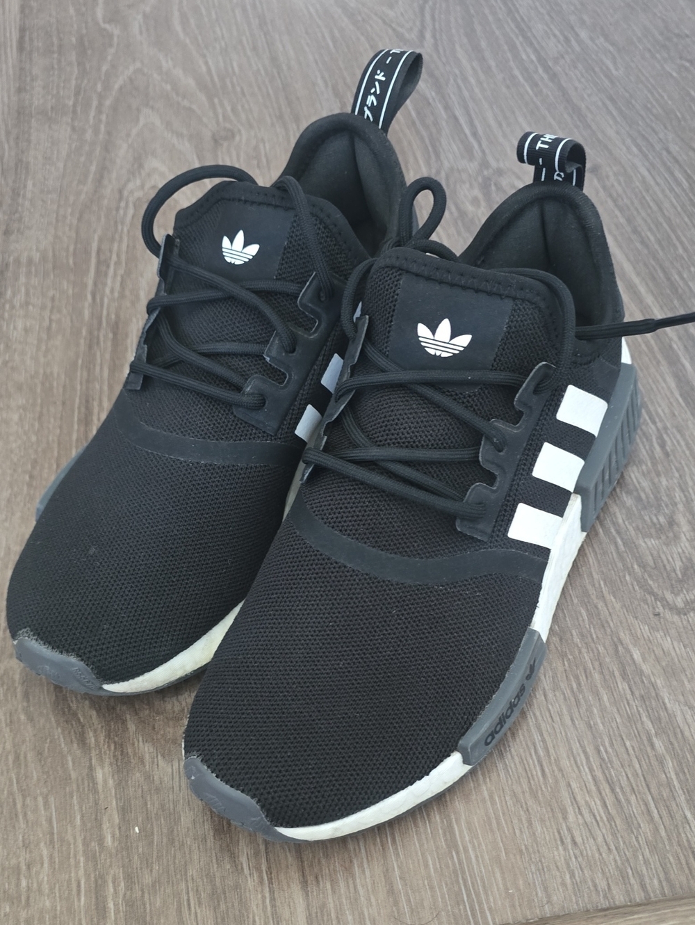 adidas NMD_R1 Black Sneakers with White Stripes